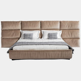 Visionnaire Palau Regular Bed: Modern luxury bed featuring a unique feather headboard for ultimate comfort. Upholstered frame with a matelassé effect and customisable metal finishes create a sophisticated and inviting bedroom haven.