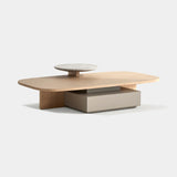 Coleccion Alexandra Estrato Coffee Table in tan ash with dune lacquer and an Amsterdam Grey honed marble top