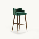 Mezzo Collection Ervin Bar Chair, Alhambra Jimena 83 and Panaz Aston 110 Pacific fabrics, matte walnut frame, polished brass, available from Touched Interiors UK