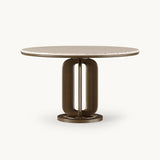 Mezzo Collection Girard Dining Table, Travertino marble top, matte walnut base and brushed brass, available from Touched Interiors UK