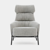 Domkapa Hubert Armchair, aspen leather and Hudson Cement fabric with a Black Texturized frame