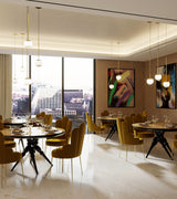 Spear Dining Table, styled in a dining room
