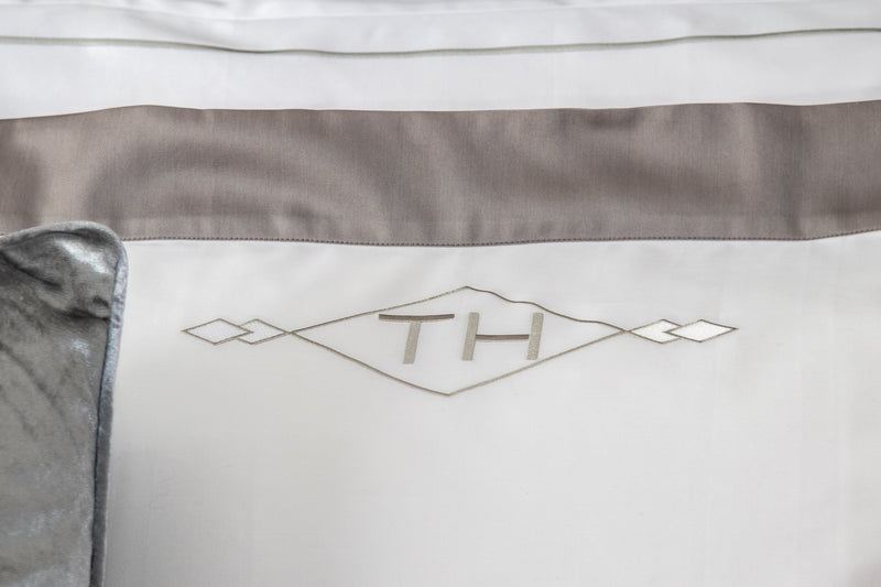 Spoil yourself with the ultimate in comfort and personalisation. Soft monogrammed bedding featuring your initials.