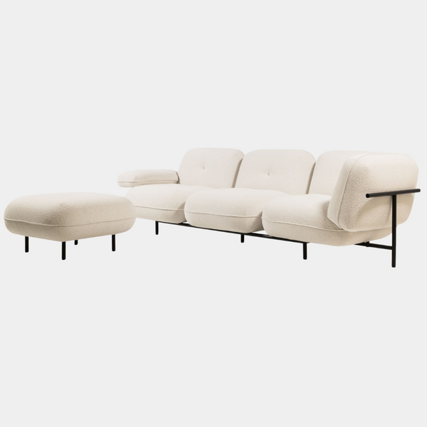 Redefine your living space with the Cloud Sofa. Rounded sections and a modular design create a unique and inviting seating arrangement.