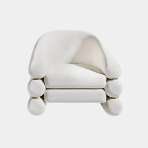 Amirah luxury cream velvet accent chair with polished brass accents, perfect for modern high-end interiors.