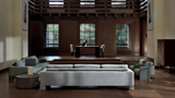Anello diamond quilted armchairs in a wood panelled library