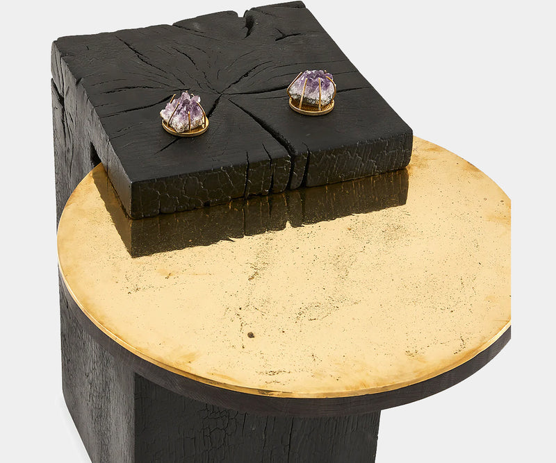 Elegant blackened oak side table with a solid brass sand-cast top, ideal for opulent home decor.