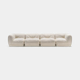 Belcastro Buckled Belt Luxury Sofa in cream fabric with brass buckles