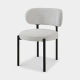 Berkeley Designs Modena Dining Chair, ivory textured fabric with black metal frame, angled view