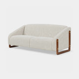Berkeley Designs Verona Sofa, ivory textured upholstery with walnut frame and brass details, angled view