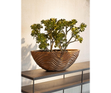 Bertarelli Curved Wave Luxury Table Planter in bronze, planted on a console