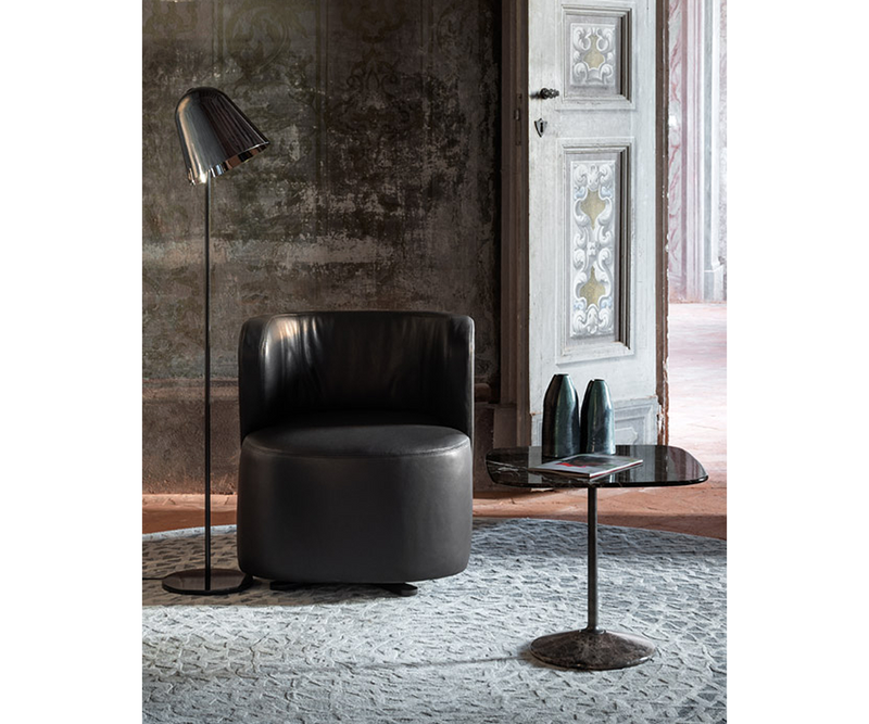 Designer swivel armchair by Lorenza Bozzoli, featuring black leather and a metal base.