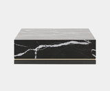 Luxury Nero Marquina marble coffee table with modern design in a stylish living room.