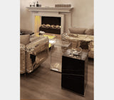 Boca do Lobo Metamorphosis Side Table beside a fireplace
