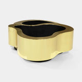 Boca do Lobo Wave Center Table in polished brass, angled view