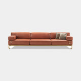 Brindisi Buckled Strap Luxury Sofa in tan leather with brown burnished brass