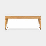 Brindisi Turned Leg Luxury Console Table shown in matt oak with brown burnished brass wheels