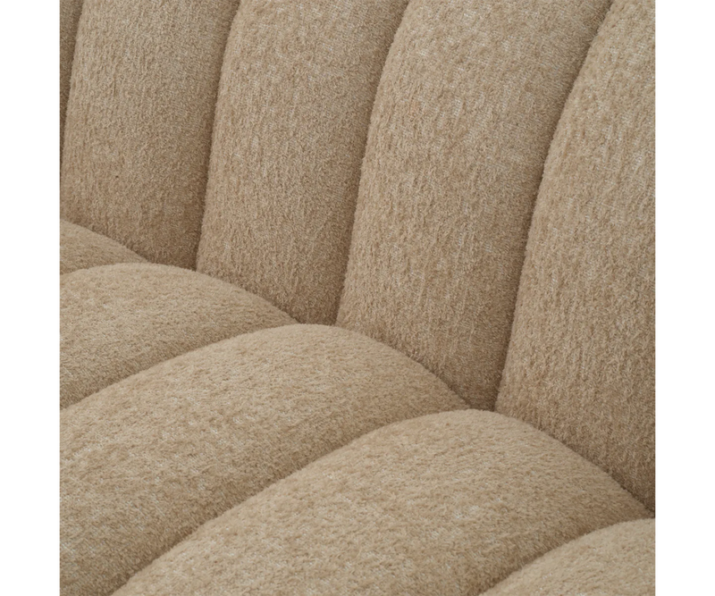 The Nuvola Sofa: A statement piece for the contemporary living room. Features a cascade sand finish and velvet cushions.