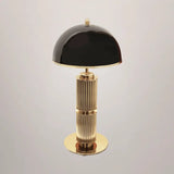 Castro Lighting Eléa Table Lamp in gold-plated brass with a black nickel shade, available from Touched Interiors UK