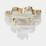 Castro Lighting Flow Chandelier in gold-plated brass with clear glass, available from Touched Interiors UK
