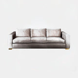 Castro Lighting Colombo Three Seater Sofa in fabric upholstery with a gold-plated brass plinth, available from Touched Interiors UK