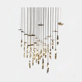 Castro Lighting Magma Linear Suspension Lamp in gold-plated brass, available from Touched Interiors UK
