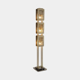 Castro Lighting Safari Floor Lamp in gold matte brass, available from Touched Interiors UK