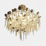 Castro Lighting Tuscania Chandelier in gold-plated brass with crystals, available from Touched Interiors UK