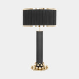 Castro Lighting Taylor Table Lamp in gold brushed brass with a fabric lampshade, available from Touched Interiors UK