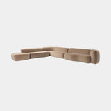 Catone modular sofa in sand velvet in an L-shaped corner composition