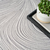 Central Park West Swirl Grey Luxury Rug, available from Touched Interiors UK