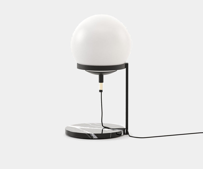 Laskasas Clarke Table Lamp with a spherical glass shade and Nero Marquina marble base, perfect for luxury interiors.