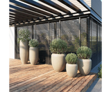Colonna Stone Grey Luxury Floor Vase, group on a garden terrace