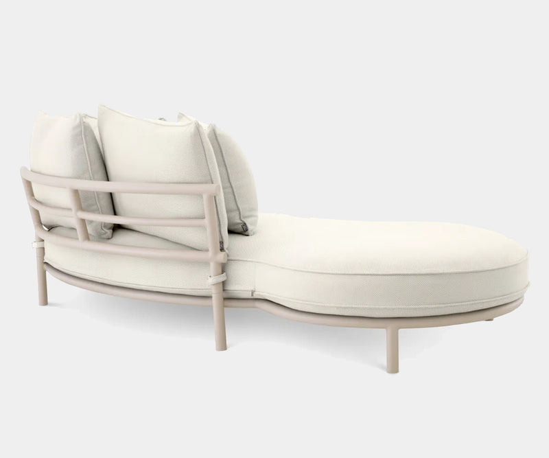 The Forne Outdoor Sofa by Eichholtz offers comfort and style for your outdoor space. Features sand finish and plush cushions.