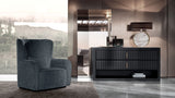 Daytona Palmera Easy Armchair in Nice Ardesia fabric, styled in a bedroom