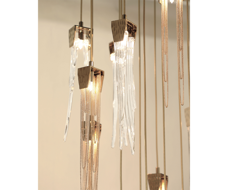 Modern luxury lighting with the Empyrean Chandelier in an elegant home decor setting.