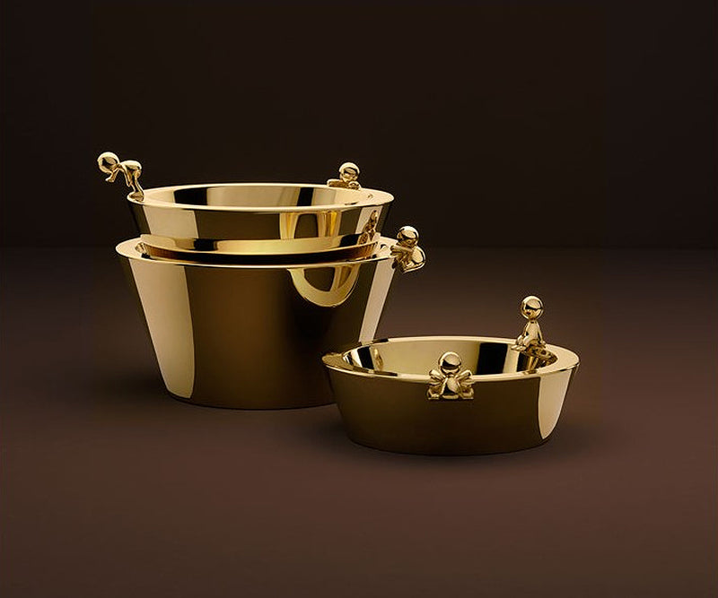 Sophisticated Omini Bowls in stainless steel, enhancing any dining experience with their playful and unique design.