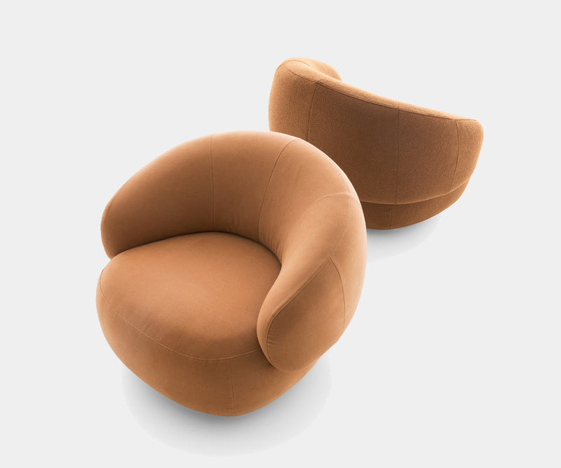 Experience ultimate relaxation with the plush cushions of the Ditre Italia Cookie Armchair, a sculptural statement piece of modern design.