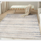 Drift Blue Luxury Rug, available from Touched Interiors UK