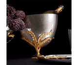 Luxury champagne bucket by L'Objet, featuring a dynamic fern design and gold accents for opulent home entertaining.