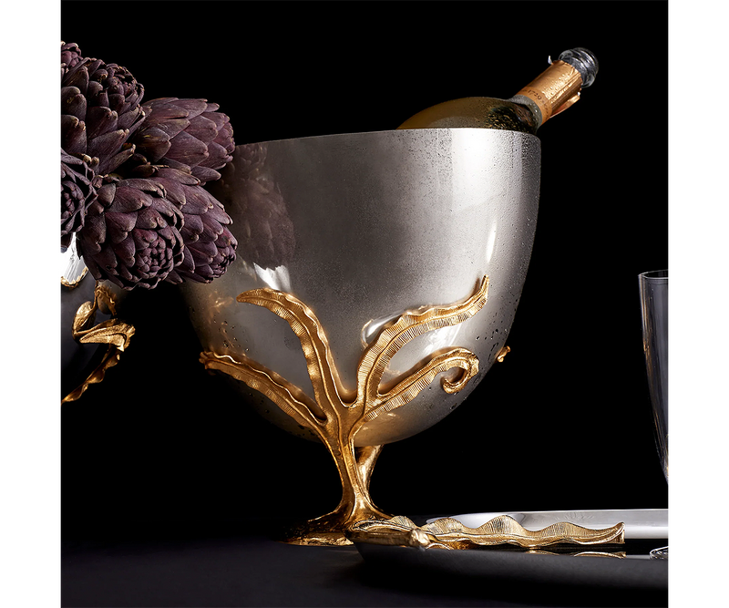 Luxury champagne bucket by L'Objet, featuring a dynamic fern design and gold accents for opulent home entertaining.