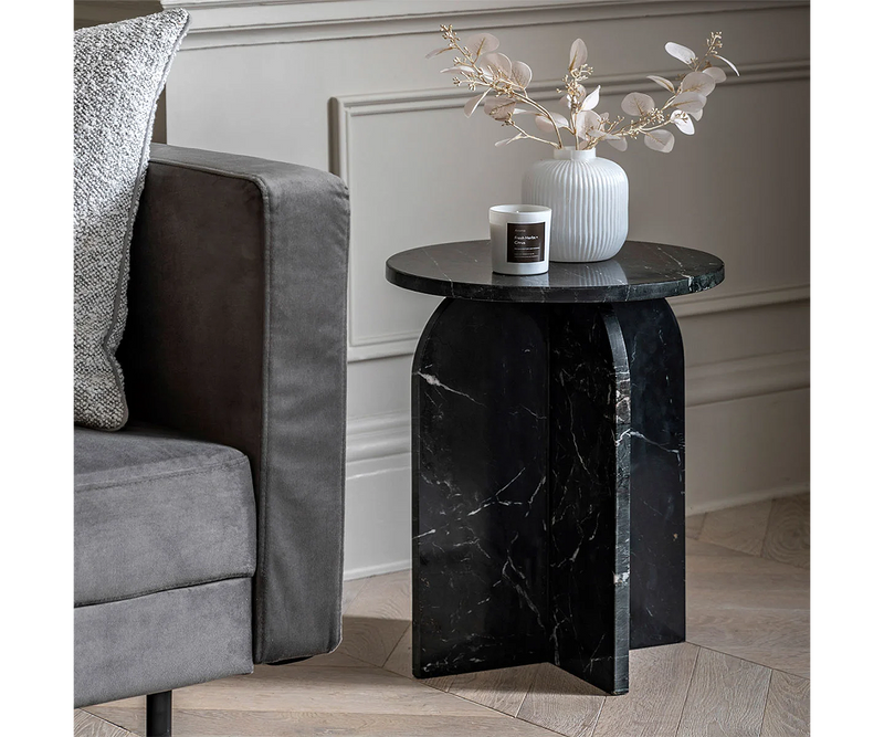 Elegant marble side table in a minimalist modern living space, enhancing home decor.