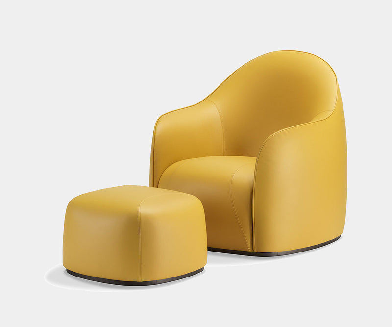 Comfortable seating in the Ghidini 1961 Sweet Lounge Chair, a statement piece for luxury living spaces.