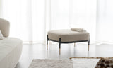 Harlow Floating Frame Luxury Pouf styled in a luxury interior