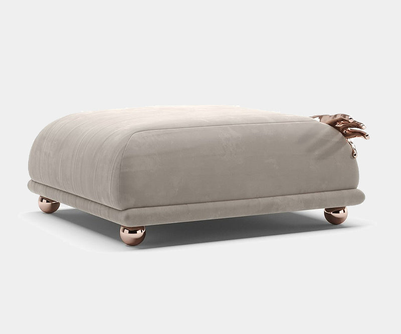 High-end rose gold ottoman with artistic brass detailing for modern luxury homes