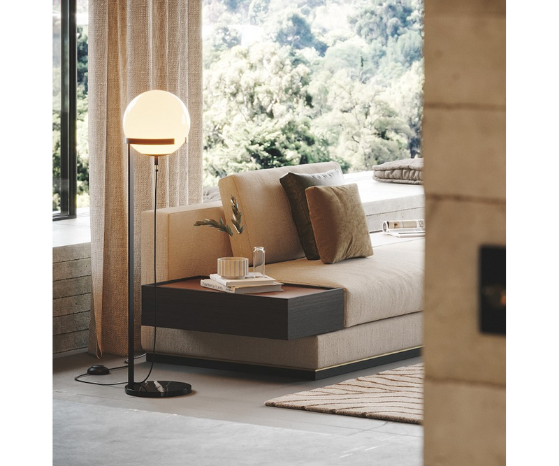 Laskasas Clarke Floor Lamp providing ambient lighting in a chic hallway with contemporary design elements.