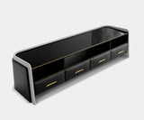 High-end Charla TV cabinet showcasing sleek design with smoked glass, leather drawers, and brass details