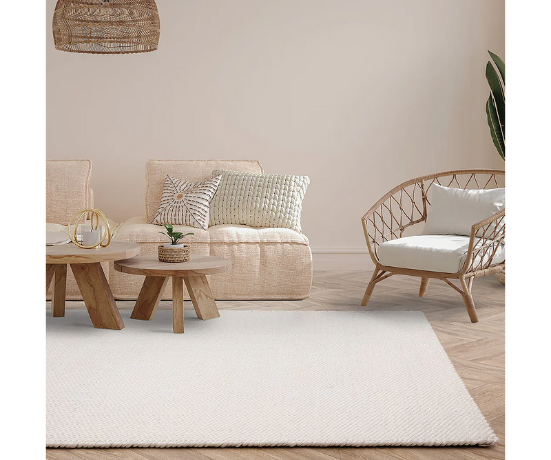 High-end Zander Ivory rug crafted from wool and polyester for timeless luxury.