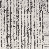 Irradiant Cream Black Luxury Rug, available from Touched Interiors UK