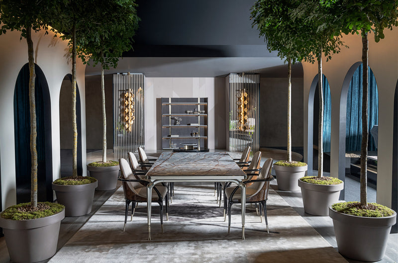 The Perfect Blend of Style and Comfort: The Jera Padded Chair Collection by Visionnaire. Nestled in the Jera Radica with its stunning briarwood backrest or the classic quilted velvet option, you'll experience unparalleled comfort and a touch of natural elegance in any space.